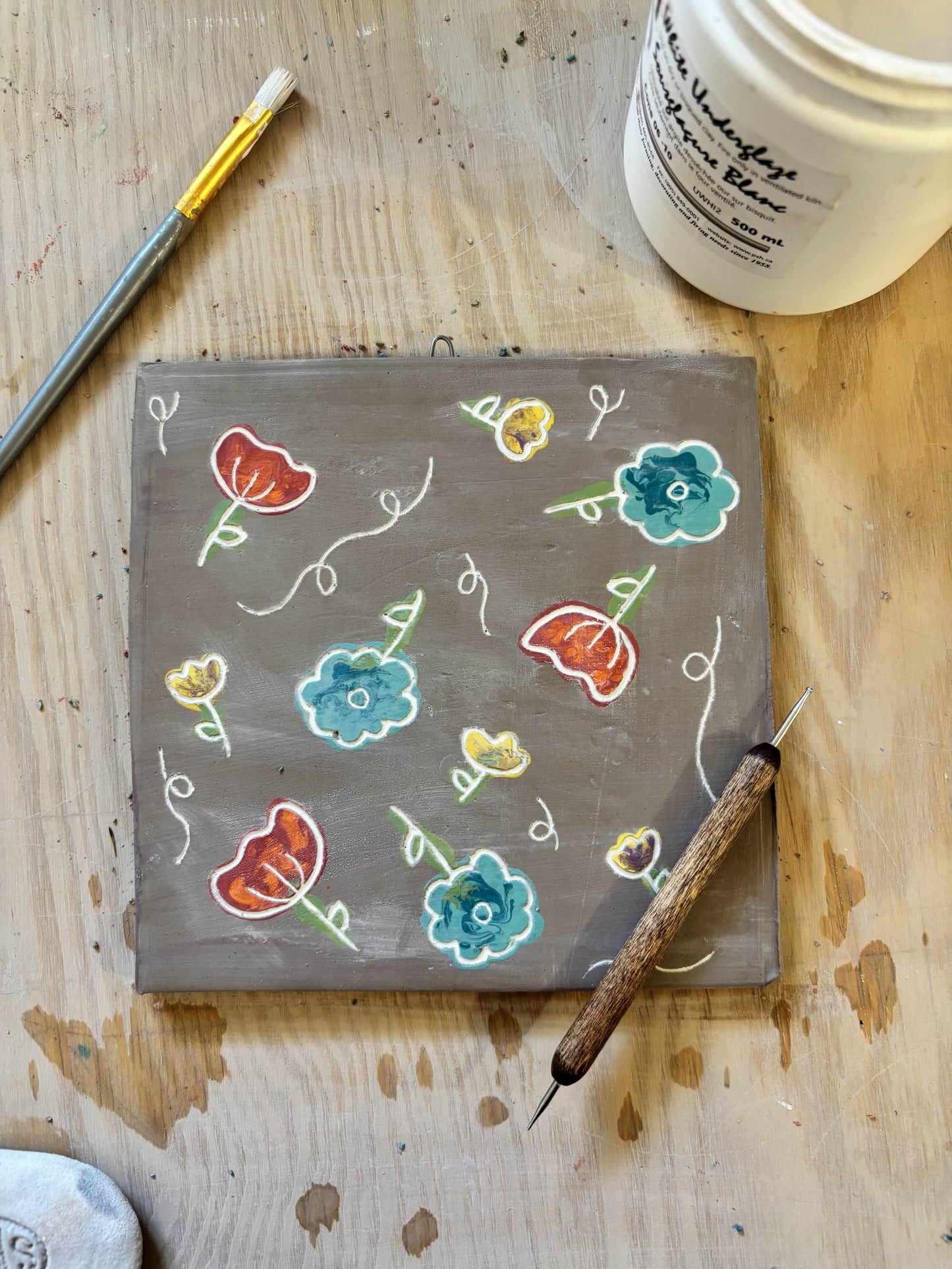 Sgraffito on a Tile
